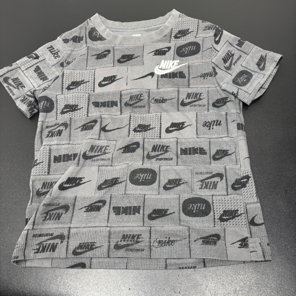 Nike Boy's Gray All-over Print T-shirt Size Medium 5-6yrs Swoosh Spellout Shirt